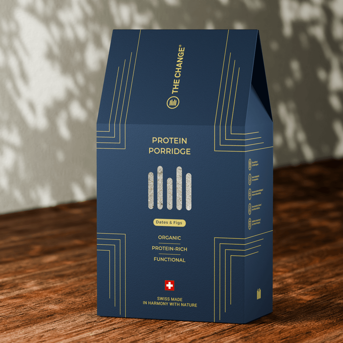 Organic protein porridge with dates and figs in a navy blue packaging, Swiss made and functional for a healthy diet.