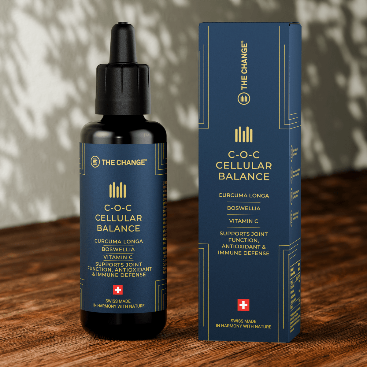 C-O-C Cellular Balance serum in dark blue bottle, enriched with curcuma long and boswellia, promotes joint health and immune support.