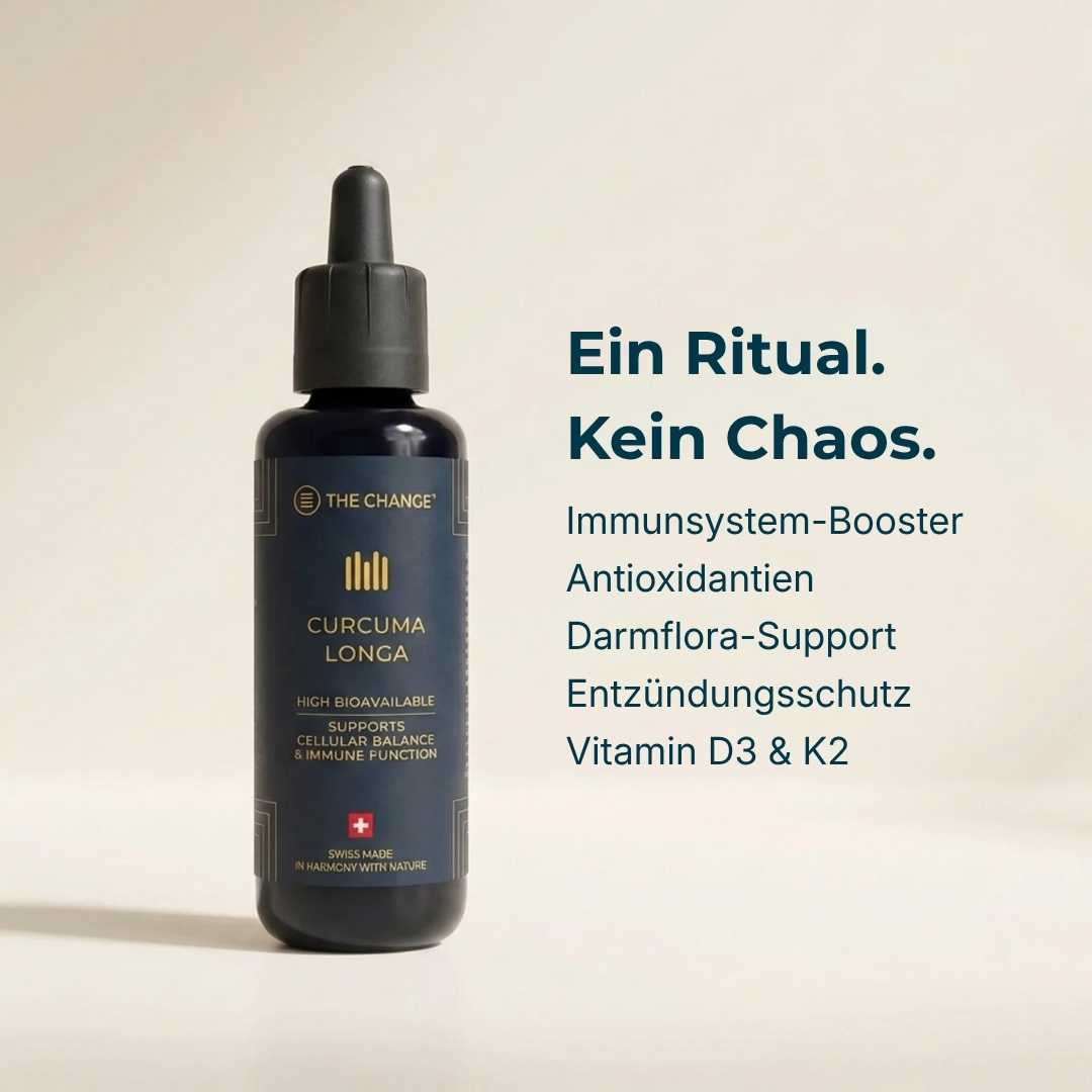 Dark blue bottle of Curcuma Longa with dropper, featuring antioxidant and immune system support.