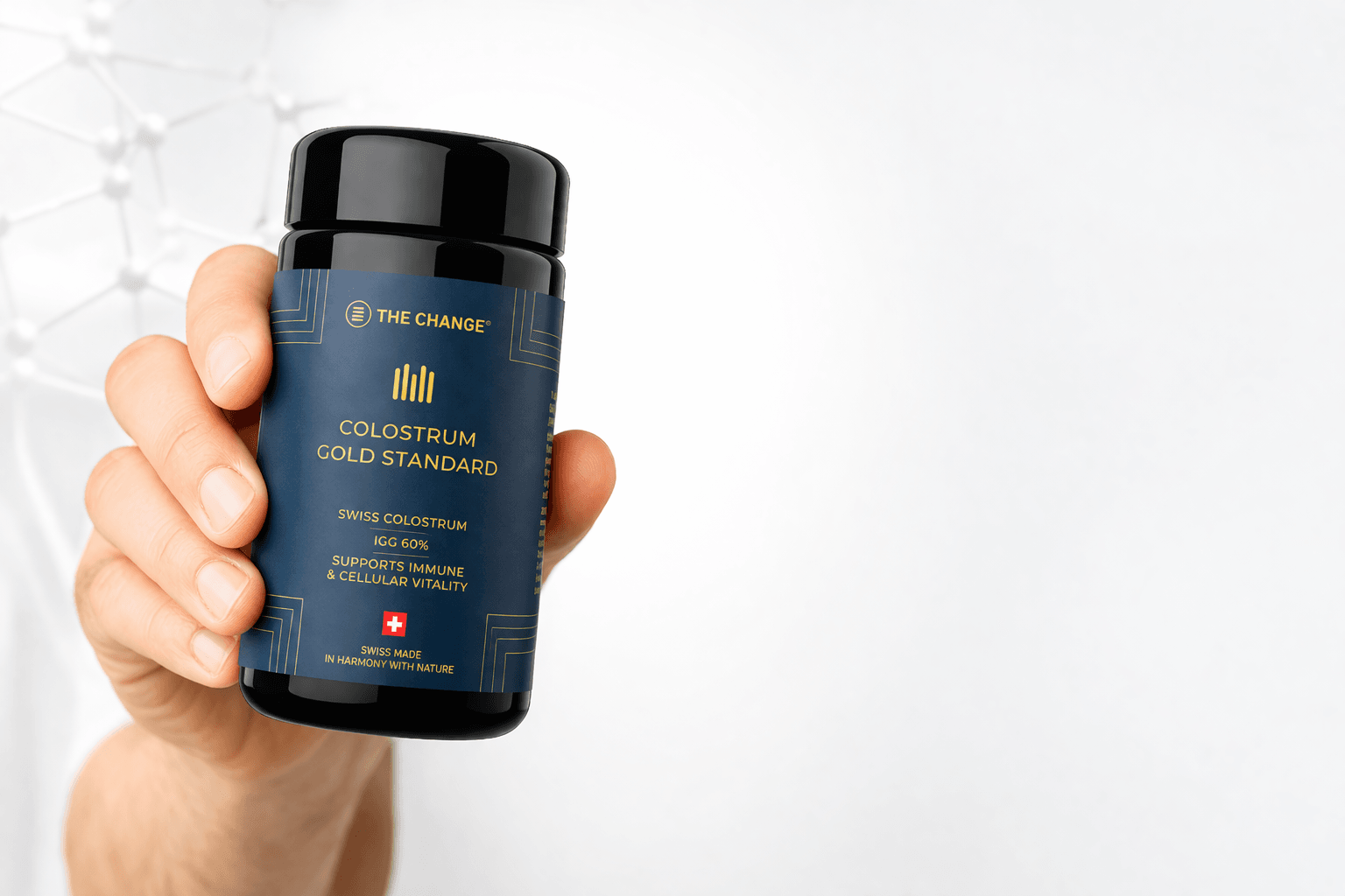 Black bottle of Swiss Colostrum Gold Standard, 120 capsules, supports immune and cellular vitality.